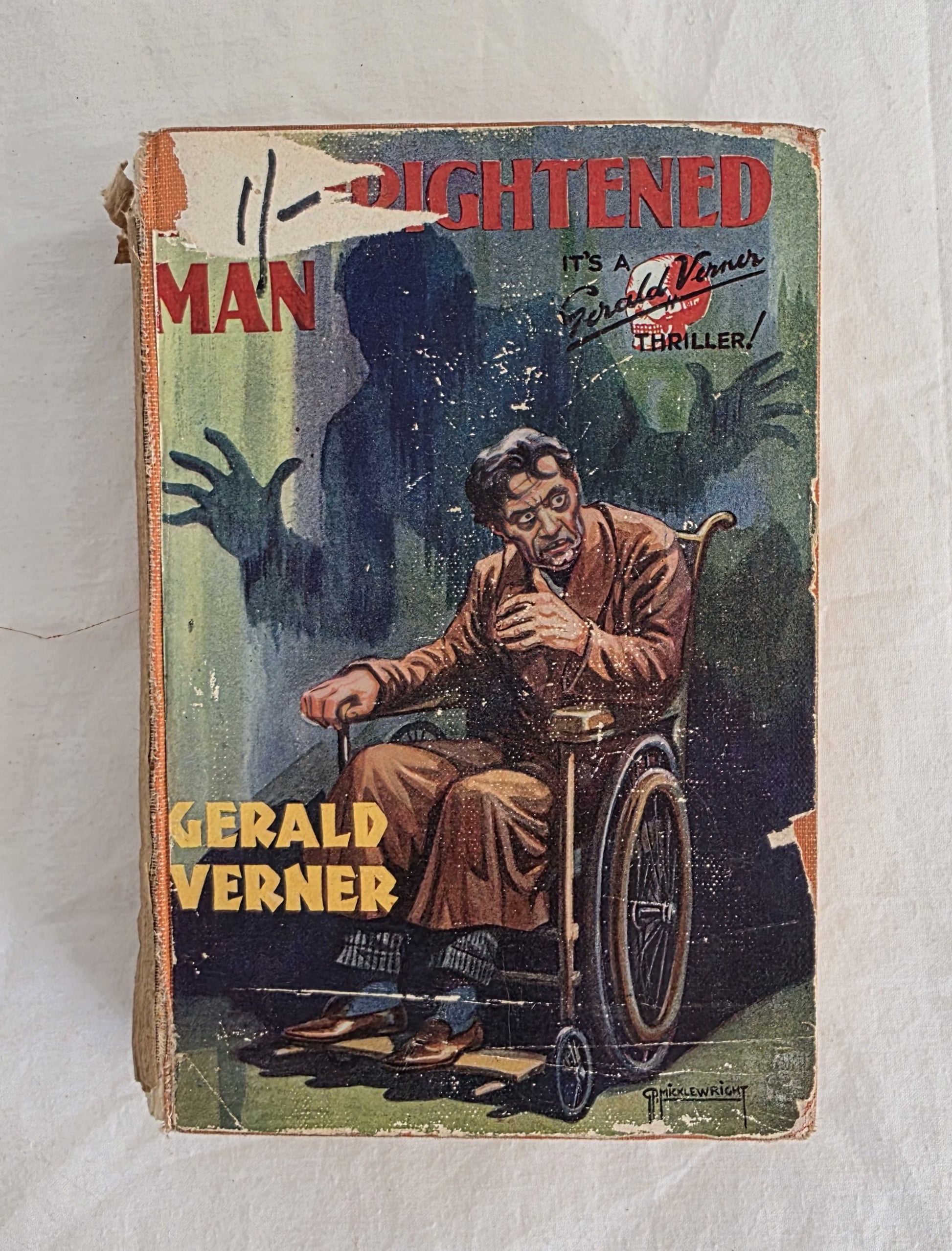 Vintage book cover with a man in a wheelchair and text 'Lightened Man' by Gerald Verner.