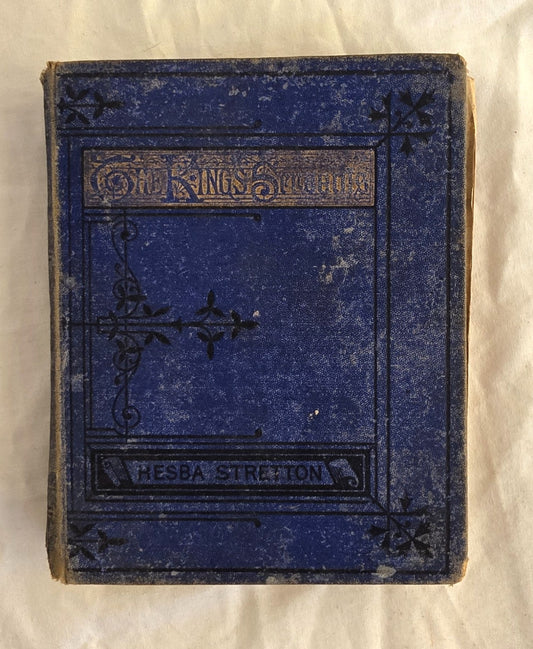 Vintage blue book with decorative text on a white background