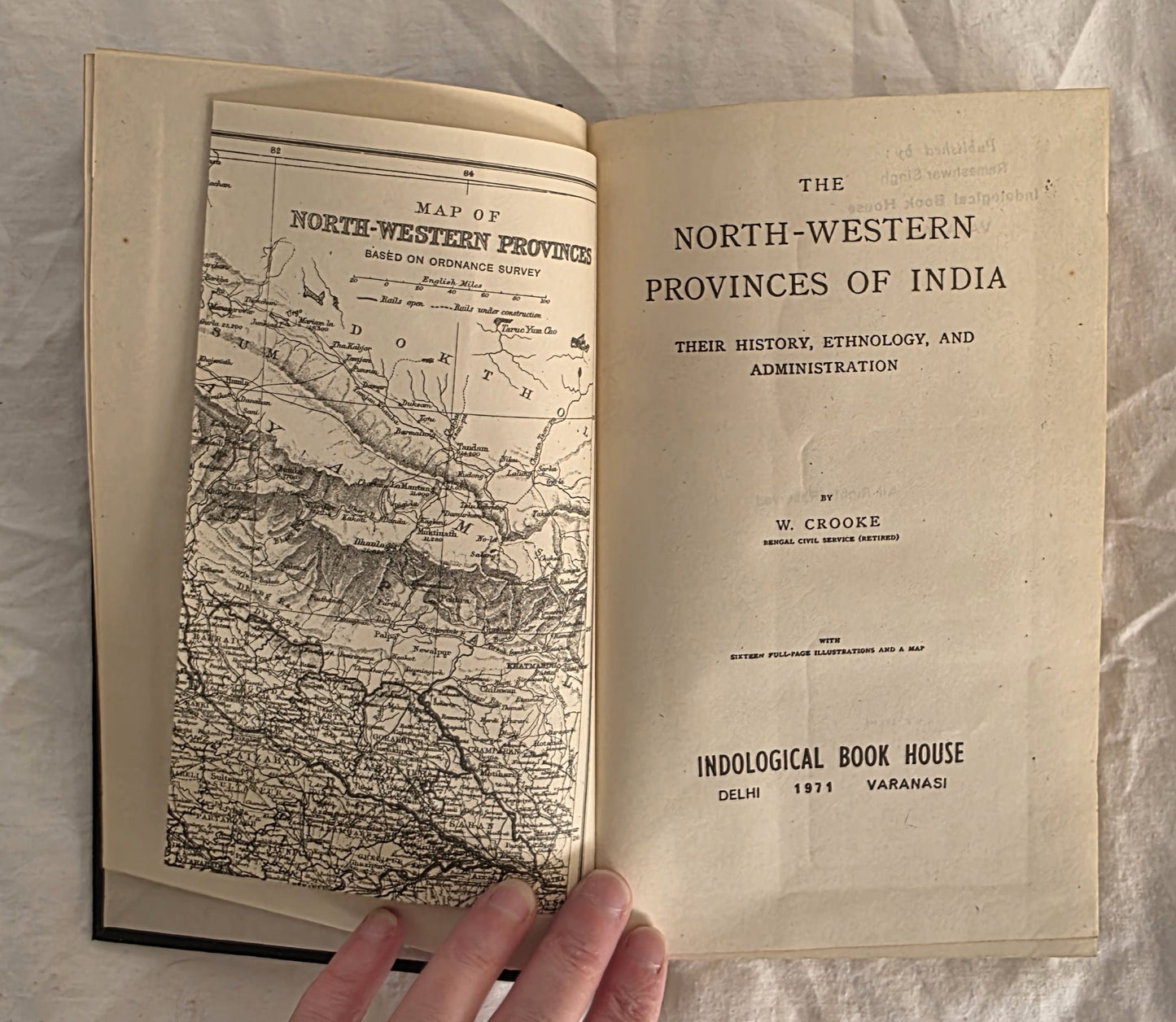 Open book showing a map and text on the North-Western Provinces of India