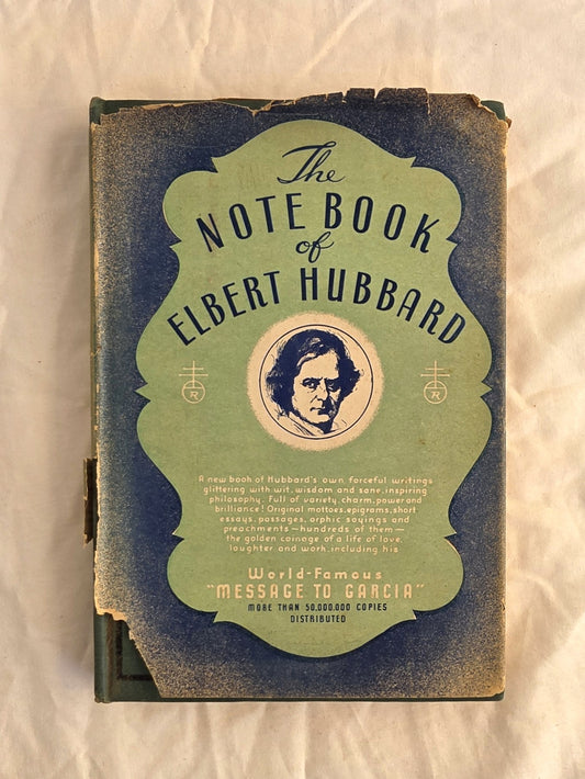 Vintage book titled 'The Notebook of Elbert Hubbard' with a green and blue cover on a white background.