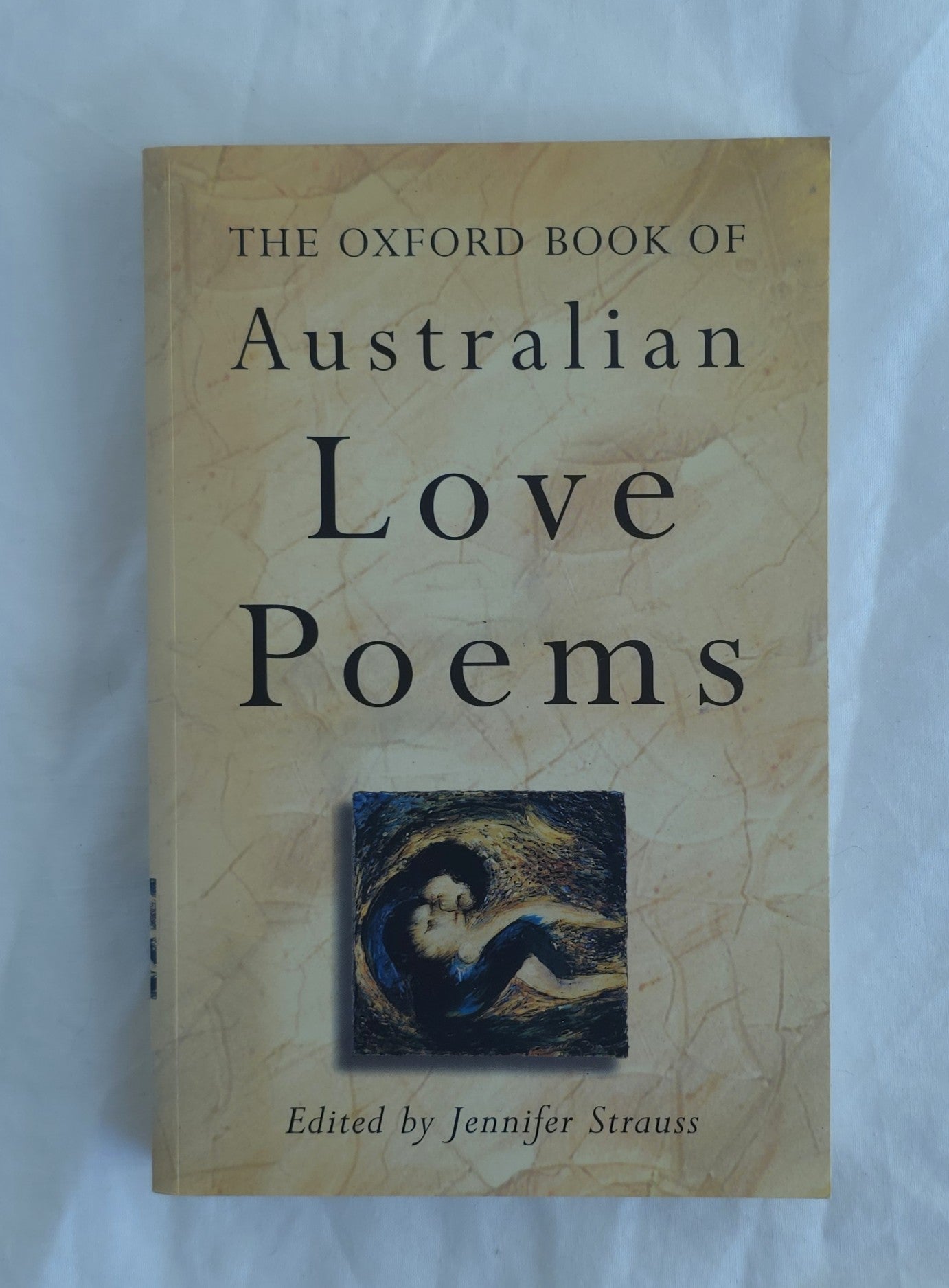 Book titled 'The Oxford Book of Australian Love Poems' on a light background