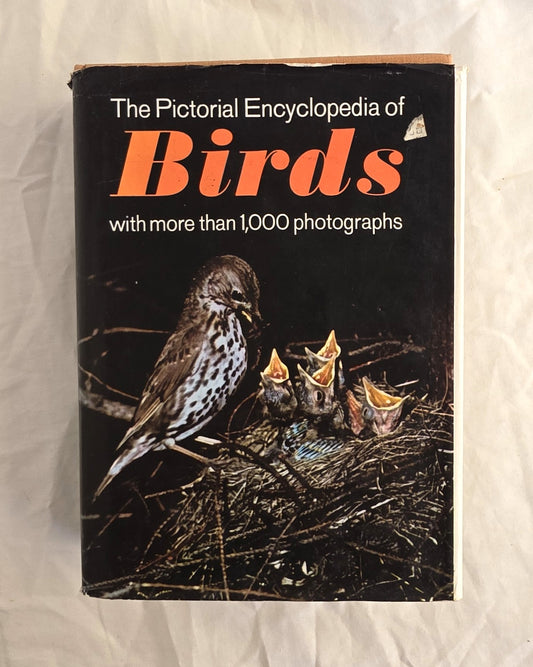 Book titled 'The Pictorial Encyclopedia of Birds' with a bird and chicks illustration on a black background.