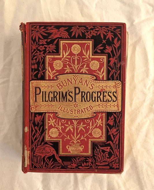 Vintage book cover of 'Bunyan's Pilgrim's Progress Illustrated' with intricate designs on a white background.