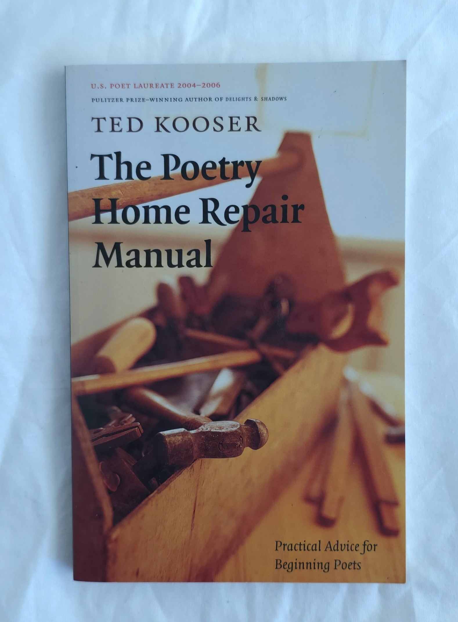 Book cover of 'The Poetry Home Repair Manual' by Ted Kooser on a white background