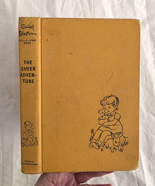 Vintage book titled 'The Queer Adventure' with illustrations on a textured white background