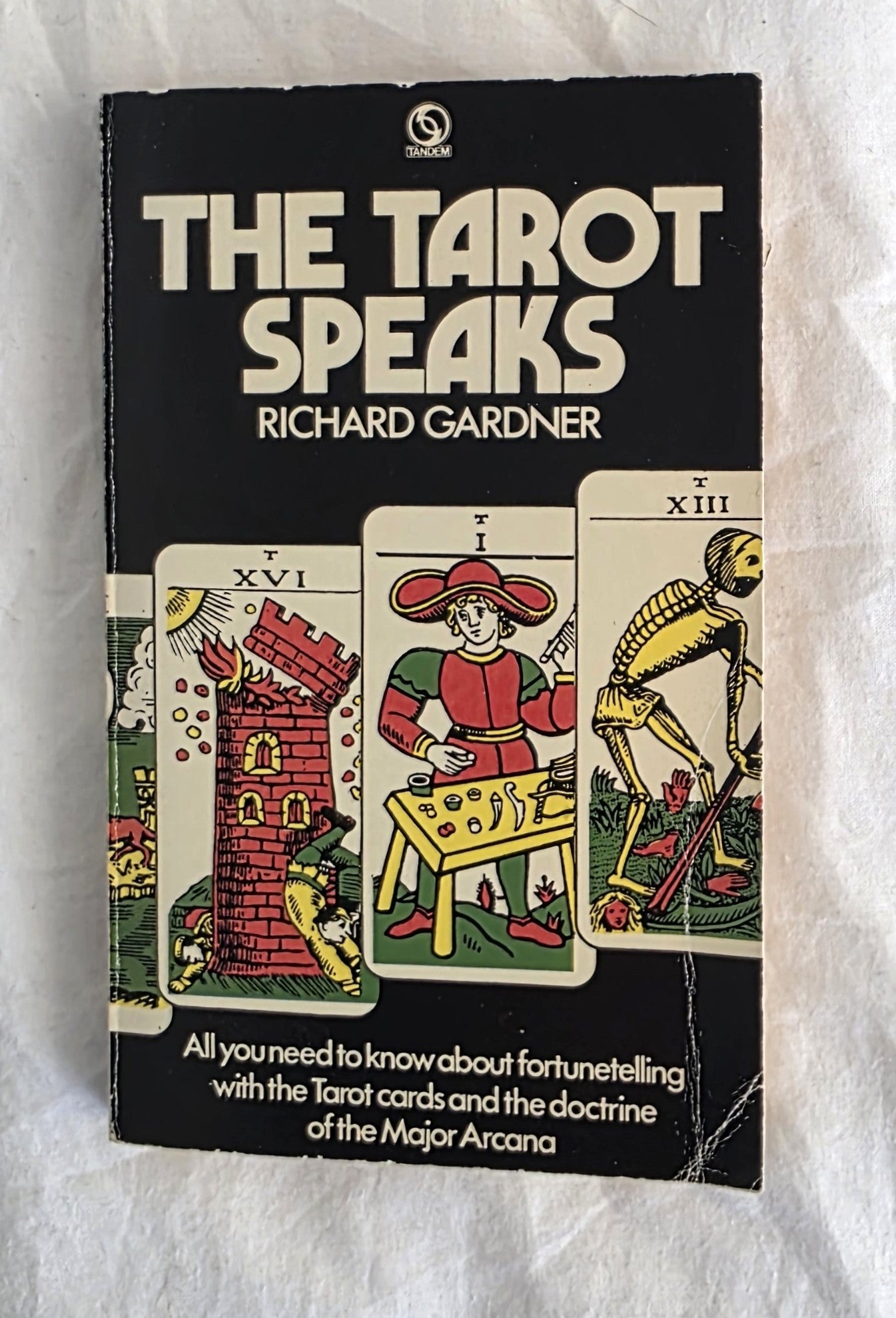 Book titled 'The Tarot Speaks' by Richard Gardner on a textured white background