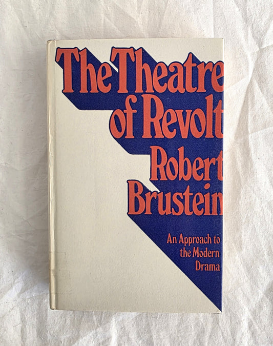 Book titled 'The Theatre of Revolt' by Robert Brustein on a textured white background