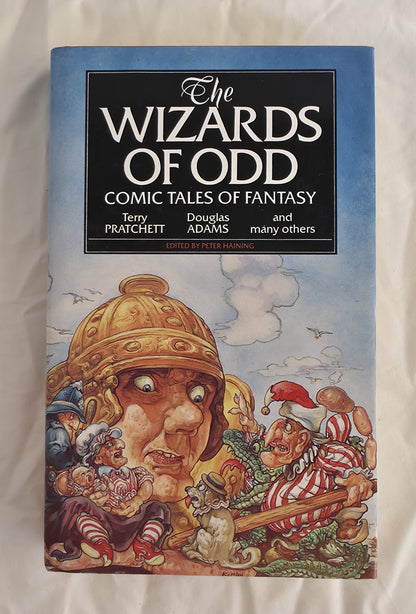 Book cover of 'The Wizards of Odd' with a fantasy illustration on a white background