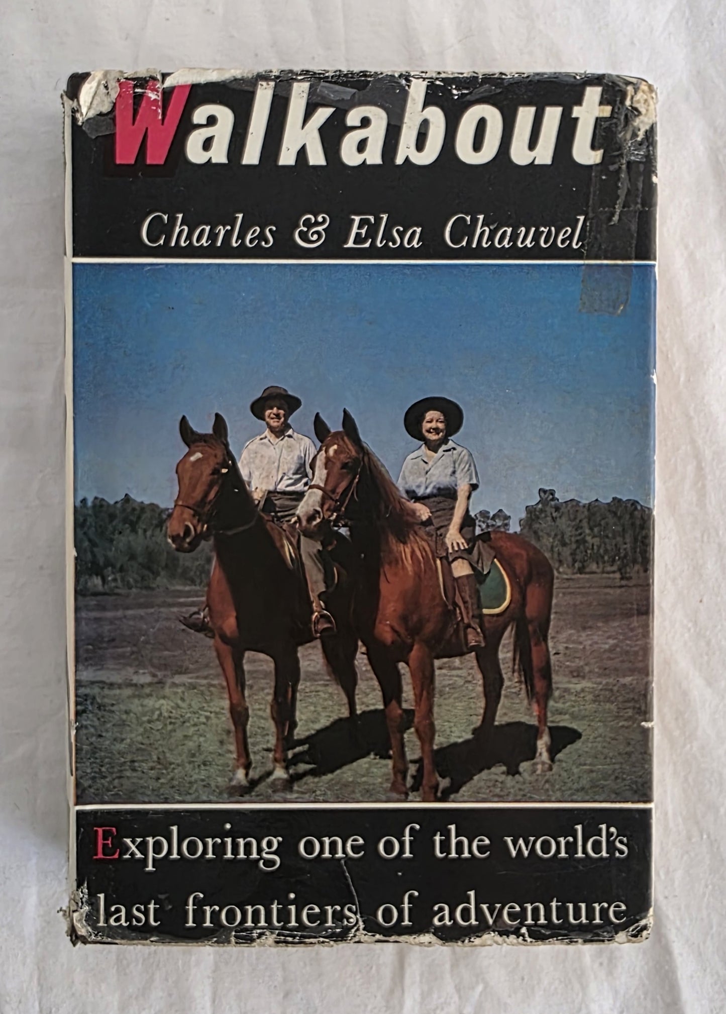 Book cover of 'Walkabout' by Charles & Elsa Chauvel featuring two people on horses.