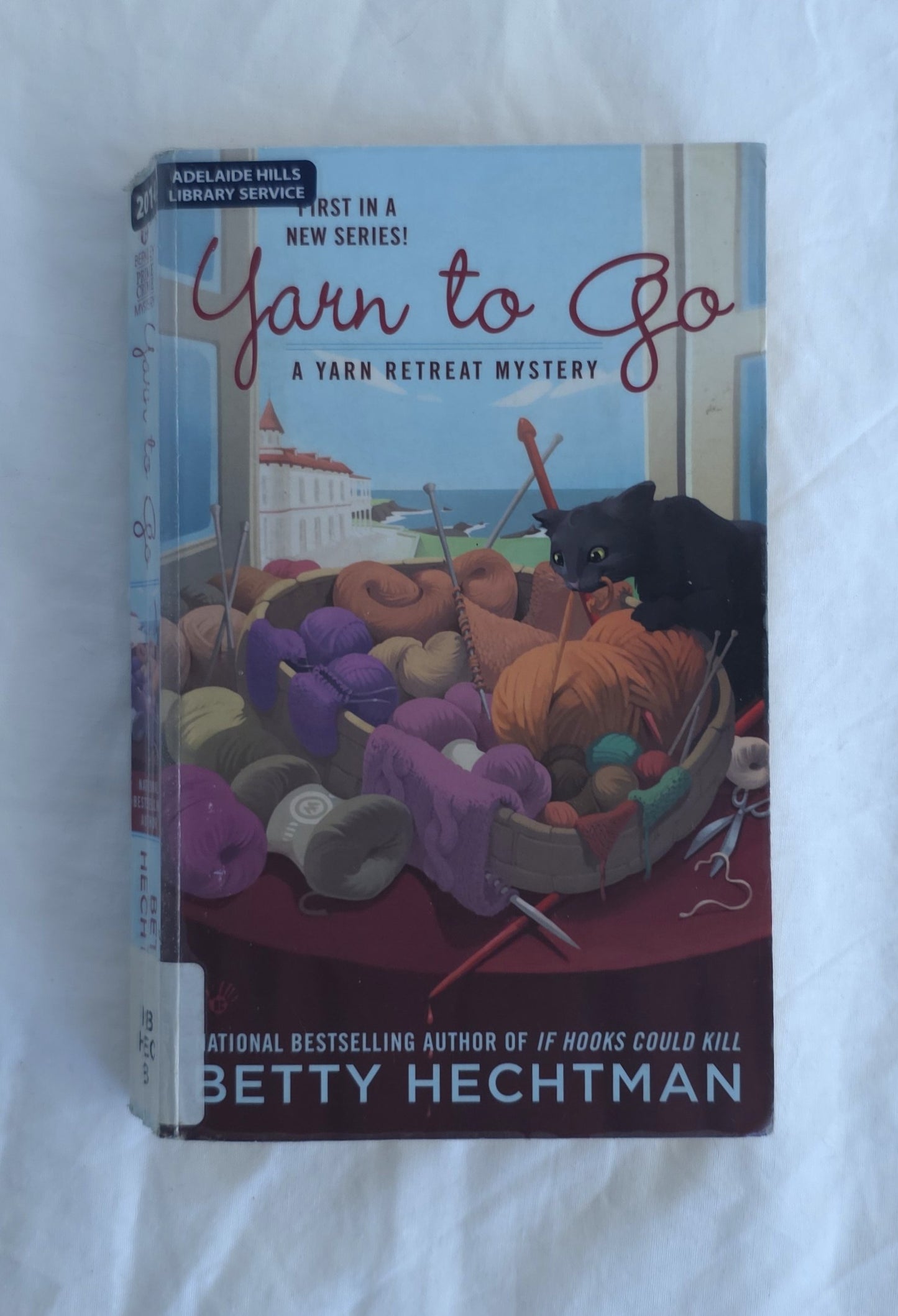 Book titled 'Yarn to Go' by Betty Hechtman on a white background