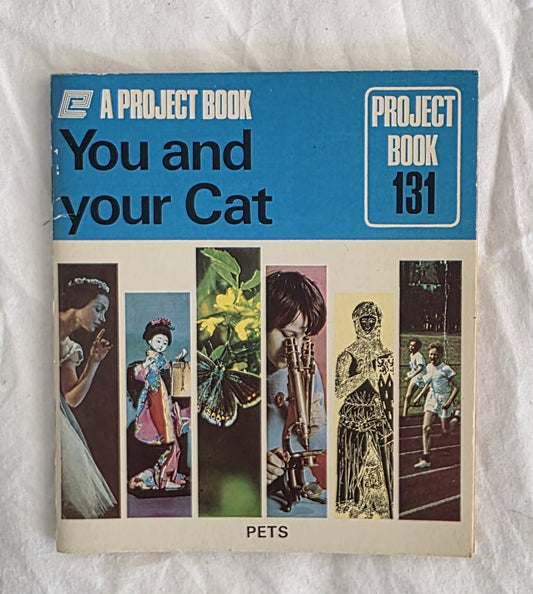 Book titled 'You and your Cat' with a blue and beige cover on a textured white background