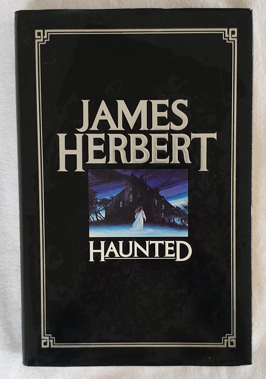 Haunted by James Herbert