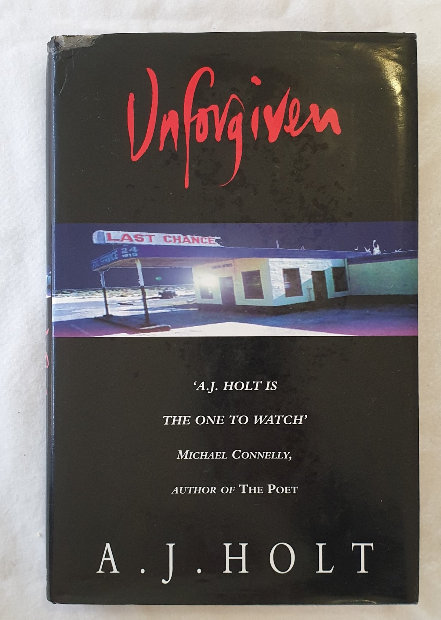 Unforgiven  by A. J. Holt