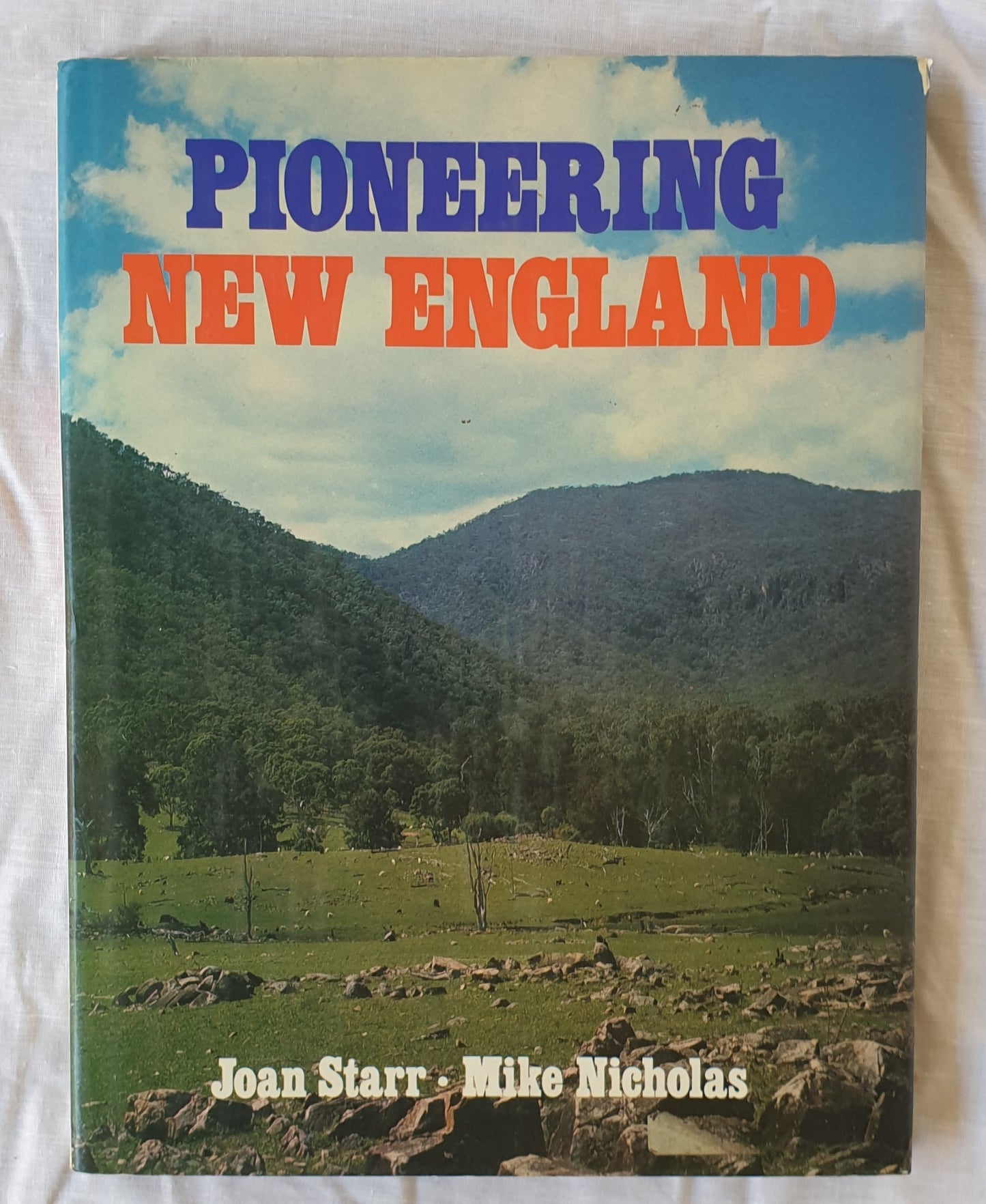 Pioneering New England  Text by Joan Starr  Illustrated by Michael Nicholas