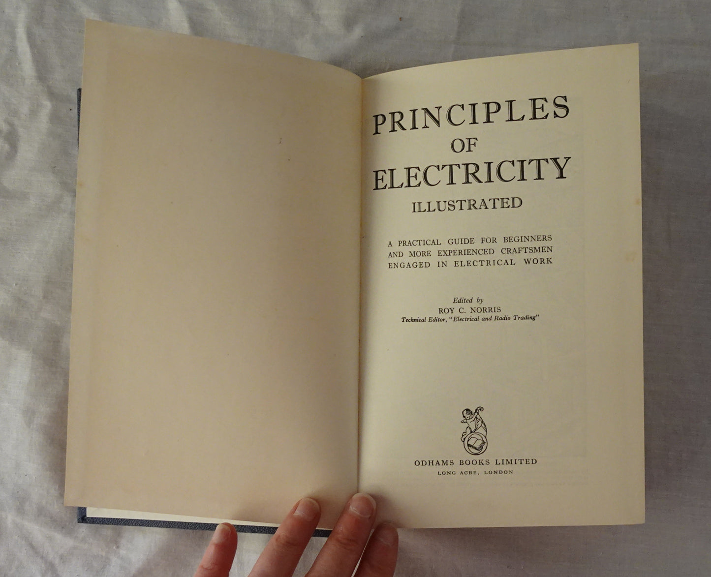 Principles of Electricity Illustrated by Roy C. Norris