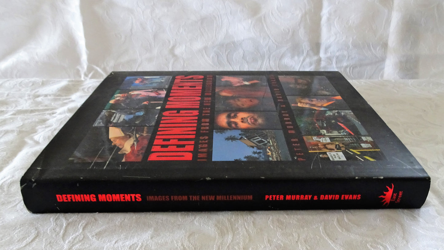 Defining Moments Images From The New Millennium by Peter Murray & David Evans